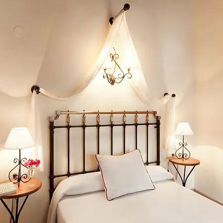 Отель Casa Del Capitel Nazari 3*