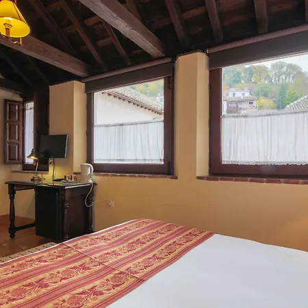 Отель Casa Del Capitel Nazari 3*